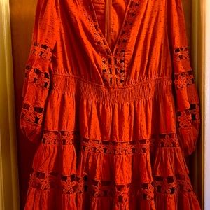 Beautiful tiered Rust colored dress. Fun party dress with full bishop sleeves